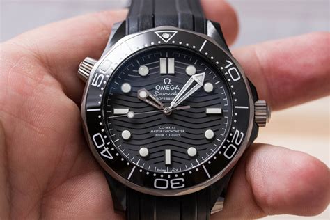 omega seamaster diver 300m black black|omega seamaster black ceramic review.